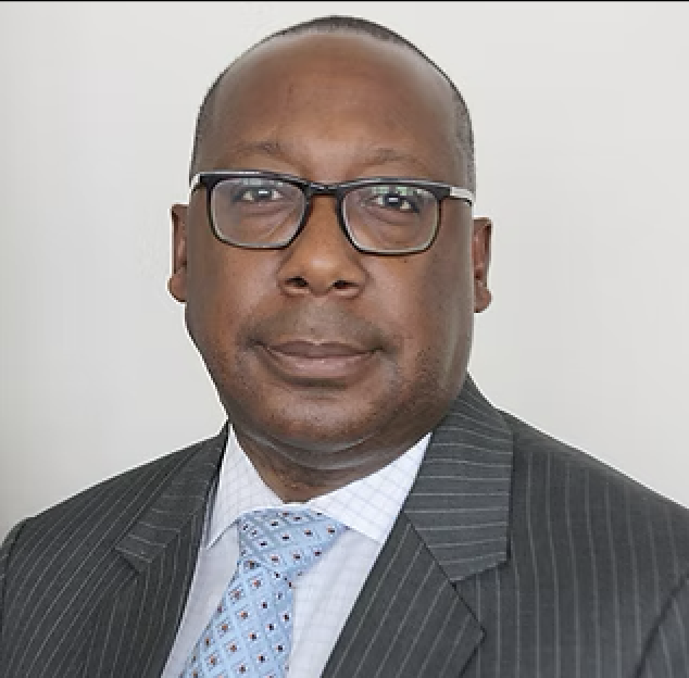 Headshot of A. Cornelius Baker