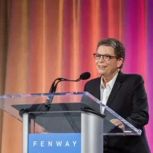 Susan M. Love at a Fenway health stand